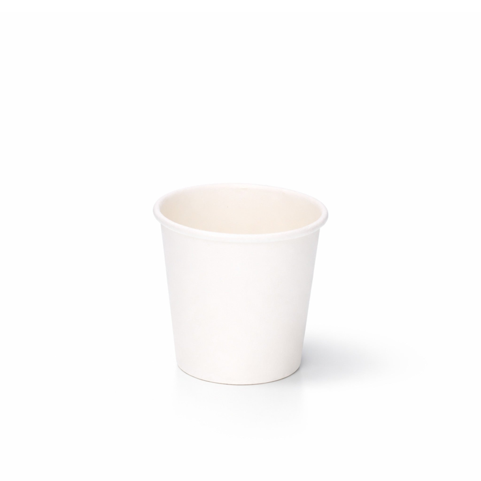 White 6oz single wall paper cup centred on a plain white background, subtle shadow beneath showing full height and rolled rim
